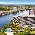 Hilton Miami Airport Blue Lagoon hotel hosting Homestead NASCAR Ticket Packages guests during Championship Weekend