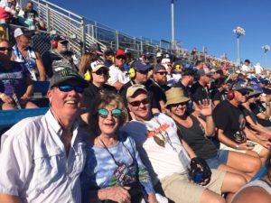 Race fans enjoying a sunny day in the grandstands at Homestead-Miami Speedway
