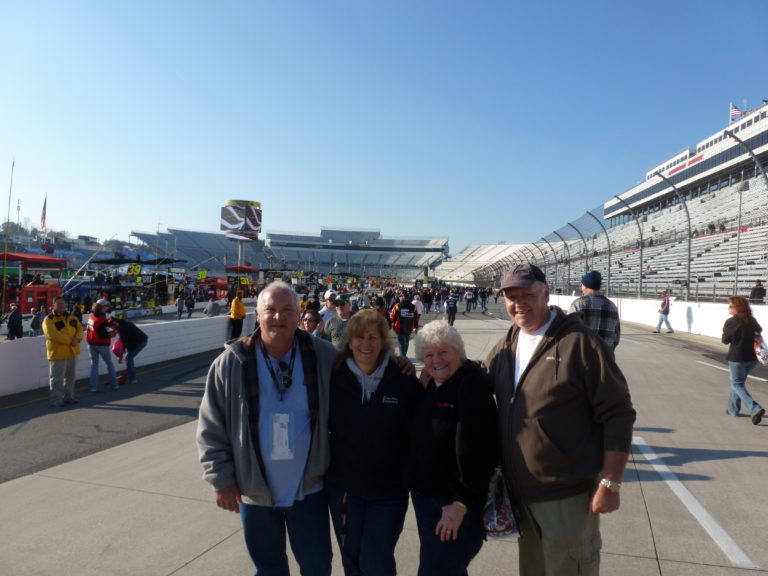 Race fans standing on pit road at Martinsville Speedway before the NASCAR race