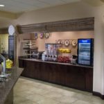 Breakfast buffet area at Embassy Suites Kansas City International Airport with hot and cold options