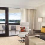 Hilton Miami Airport Blue Lagoon suite for Homestead NASCAR Packages guests overlooking the Blue Lagoon