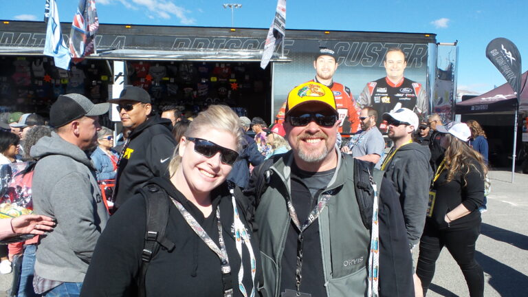 RaceAway Hospitality guests shopping at NASCAR merchandise haulers at Las Vegas Motor Speedway