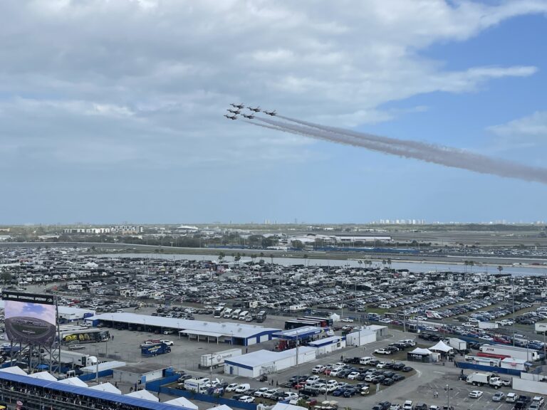 Military jets perform a flyover above Daytona International Speedway before the start of the Daytona 500