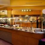 Guests enjoy the Embassy Suites Greensboro breakfast buffet as part of Martinsville NASCAR Packages and Martinsville NASCAR Ticket Packages