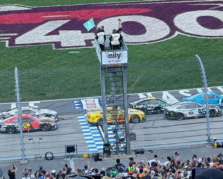 Green flag waves at Nashville Superspeedway with Nashville NASCAR Ticket Packages