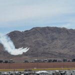 Air show with jet smoke trails over Las Vegas Motor Speedway during NASCAR weekend