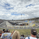 RaceAway guests watch close racing on the half-mile oval at Martinsville Speedway with a Martinsville NASCAR Package that includes reserved NASCAR Tickets