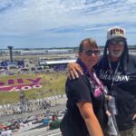 Fans enjoying race day at Nashville Superspeedway with our Nashville NASCAR Ticket Package