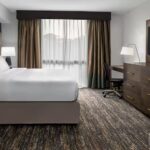 Hotel room at Embassy Suites Nashville Airport featured in Nashville NASCAR Packages