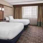 Double queen room at Embassy Suites Nashville Airport featured in RaceAway's Nashville NASCAR Ticket Package