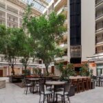 Atrium lounge at Embassy Suites Nashville Airport featured in Nashville NASCAR ticket Packages
