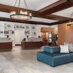 Hotel lobby at Embassy Suites Nashville Airport featured in Nashville NASCAR Packages