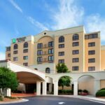 Exterior view of Embassy Suites Greensboro Airport, the host hotel for RaceAway Hospitality guests
