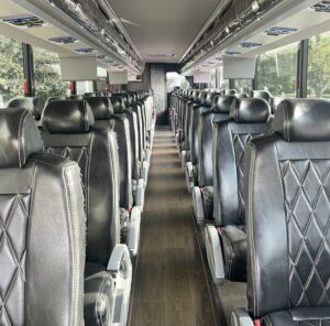 Luxury motorcoach transportation included with NASCAR Travel Packages from RaceAway Hospitality.