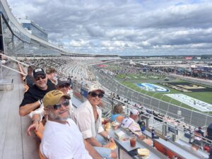 RaceAway Hospitality guests enjoying NASCAR Travel Packages at Charlotte Motor Speedway.