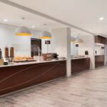 Guests enjoy included breakfasts with RaceAway NASCAR Ticket Packages staying at the Embassy Suites Atlanta Airport