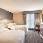 Double queen suite bedroom at Embassy Suites Atlanta Airport, RaceAway's choice for Atlanta NASCAR Hotels.