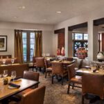 Elegant dining room at Embassy Suites Phoenix – Tempe, featured in our Phoenix NASCAR Hotels and Phoenix NASCAR Ticket Packages.