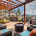Outdoor patio with cozy seating at the Hilton Garden Inn Pigeon Forge, featured in our Bristol NASCAR Hotels and Bristol NASCAR Ticket Packages.
