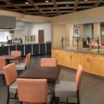 Breakfast area at Embassy Suites by Hilton Birmingham – Hoover hotel — comfortable dining space for guests of a RaceAway Talladega NASCAR Ticket Package
