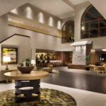 Elegant lobby at Embassy Suites Phoenix – Tempe, featured in our Phoenix NASCAR Hotels and Phoenix NASCAR Ticket Packages.