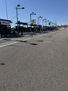 Pit road at Kansas Speedway sits ready for race-day activity during the 2026 AdventHealth 400 weekend.
