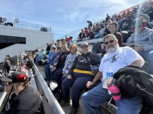 RaceAway guests sit together in the grandstands at Martinsville Speedway during the 2026 Cook Out 400.