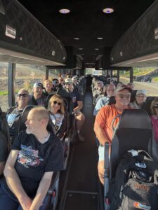 RaceAway guests ride together on the motorcoach during the 2026 Food City 500 weekend at Bristol Motor Speedway.