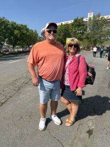 Two RaceAway guests pose for a photo outside Bristol Motor Speedway during the 2026 Food City 500 weekend.