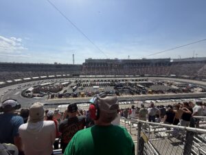 A wide view of Bristol Motor Speedway during the 2026 Food City 500 shows the track, infield, grandstands, and race-day crowd.