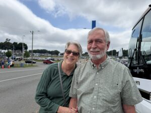 Two RaceAway guests pose for a photo outside Charlotte Motor Speedway during the 2026 Coca-Cola 600 weekend.